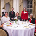 Generations of NC State alumni gather at a table for the 2024 Student Alumni Networking Dinner.