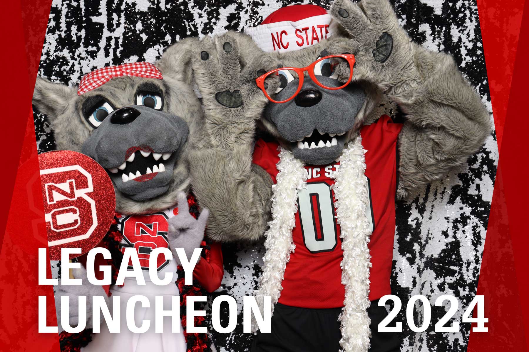 NC State's Mr. and Ms. Wuf enjoy the photo booth at Legacy Luncheon.