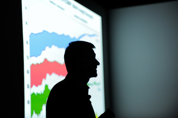Students listen to a presentation about Hurricane Katrina at the Hunt Library's visualization lab. Photo by Marc Hall